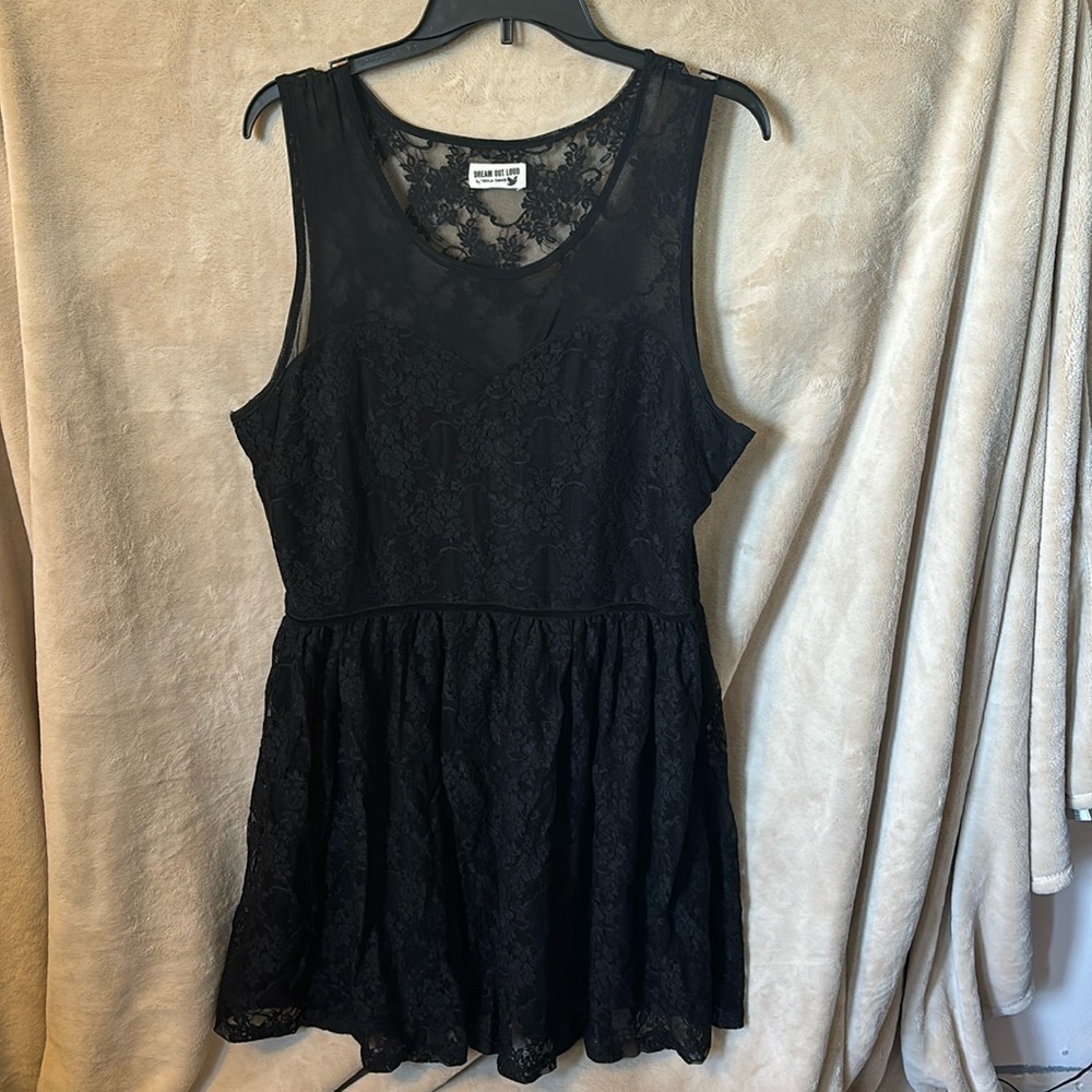 Beautiful black lace dress with sheer fabric detailing